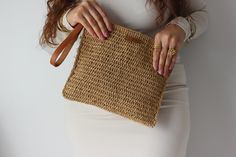 Straw Clutch Bag , Raffia Clutch Bag, Crochet Raffia Bag , Hand Woven Bag , Boho Clutch , Natural raffia bag , handmade Straw bag , straw beach bag , straw tote bag , Straw Purse, vintage straw bag , luxury bag , evening clutch , handmade gift bag , gifts for women ⭐️Specifications:⭐️ Our bag is entirely handmade! Made from 100% raffia paper thread, ensuring high quality and durability. Custom-made to suit your preferences. Interior pocket. Wipeable raffia rope. Lightweight and portable . 🎁International fast and free shipping (Note: Dimensions may vary by 1-2 cm depending on the rope condition) Please contact us for different colors and sizes. I will do my best to assist you. Discount available. Processing time: 4-5 days 📌Cleaning and Care: Clean gently with a damp cloth. Avoid excessive Natural Pouch Straw Bag With Handles, Everyday Woven Straw Pouch Bag, Straw Pouch Bag With Braided Handles, Beige Woven Pouch Straw Bag, Beige Woven Straw Clutch Bag, Beige Woven Straw Pouch Bag, Casual Straw Clutch With Braided Handles, Woven Beige Straw Clutch Bag, Woven Straw Pouch Bag