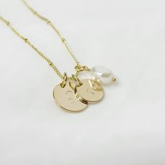 The Panama necklace is hand stamped with a letter and star sign of your choice and features a gorgeous dainty natural freshwater pearl charm. Perfect for gifting or just a little something for yourself to make your style a little more personal. ♡ Handcrafted and Handstamped ♡ Natural Freshwater Pearl  ♡ 14k Gold Plated  ♡ Water Resistant Also Available in Silver https://www.etsy.com/au/onlyysimplicity/listing/1423309324/925-sterling-silver-plated-personalised?utm_source=Copy&utm_medium=ListingMa Dainty Pearl Charm Round Necklace, Dainty Pearl Charm Necklace For Everyday, Everyday Pearl Charm Necklace, Minimalist Pearl Charm Necklace For Anniversary, Dainty Handmade Initial Pendant Charm Necklace, Dainty Hand Stamped Initial Pendant Necklace, Dainty Hand Stamped Initial Pendant Charm Necklace, Dainty Hand Stamped Initial Pendant Charm Necklaces, Dainty Hand-stamped Initial Pendant Charm Necklaces