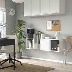 a room with a desk, chair and bookshelf on the wall next to a window