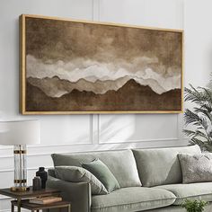 a living room filled with furniture and a painting on the wall