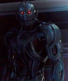 a man with red eyes in a futuristic suit