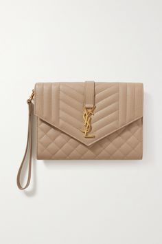 Find SAINT LAURENT Envelope Quilted Textured-leather Pouch on Editorialist. SAINT LAURENT's pouch is designed in the label's recognizable 'Envelope' silhouette and punctuated with the equally iconic 'YSL' hardware. It's been made in Italy from textured-leather and comes with an optional wristlet strap. Ysl Envelope Bag, Quilted Pouch, Quilted Clutch, Purple Envelope, Bridal Handbags, Envelope Clutch Bag, Shades Of Beige, Envelope Bag, Accessory Pouch