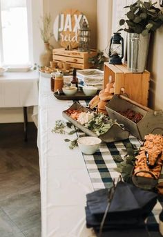 a buffet table with food and drinks on it