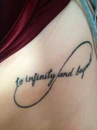 a tattoo with the words to infinity and beyond