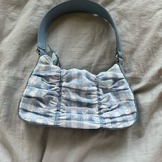 This Is A Blue And White Bag That I Have Never Worn, It Is New Trendy Blue Satchel Baguette Bag, Casual Blue Baguette Bag For Daily Use, Blue Canvas Shoulder Bag For Spring, Blue Casual Baguette Satchel Bag, Casual Blue Satchel Baguette Bag, Casual Blue Baguette Satchel Bag, Casual Blue Baguette Bag Satchel, Blue Satchel Shoulder Bag For Spring, Blue Bags For Summer Errands