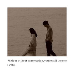 two people standing next to each other on the beach with water in the background and text that reads, with or without conversation, you're still the one i want