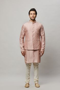 Cotton Linen blended kurta with ivory thread embroidered vest plus ivory churidar. The cotton-linen blend makes it one of our lightest and most breathable kurtas. Crafted with a collar neckline, full sleeves, and front button closure. Occasion: Can be worn to events like Sangeet, Mehendi, & Wedding WASH CARE INSTRUCTIONS - Please Dry clean only when it is applicable. Slight color variation is possible due to digital photography. Spring Bandhgala Chanderi Straight Kurta, Spring Chanderi Bandhgala Straight Kurta, Spring Cotton Silk Nehru Jacket With Chikankari Embroidery, Spring Nehru Jacket With Chikankari Embroidery In Cotton Silk, Spring Cotton Nehru Jacket With Zari Work, Spring Designer Cotton Silk Nehru Jacket, Fitted Cotton Silk Nehru Jacket For Spring, Fitted Nehru Jacket In Cotton Silk For Spring, Mehendi Wedding