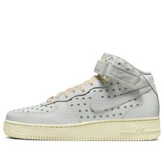 The Nike Air Force 1 Mid 'Cut Out Stars' is the perfect combination of style and comfort. Its Summit White leather upper is adorned with star-shaped cutouts, while the classic AF1 rubber sole is finished with Coconut Milk laces for a unique look. This sneaker is perfect for any activity, from a casual day out to a night on the town. Inspired by the iconic Air Force 1, this limited-edition sneaker is sure to be a hit. With its timeless style and modern features, this sneaker is the perfect addition to any wardrobe. (AF1/SNKR/Skate/Casual/Mid Top/Women's) Nike Air Force 1 Mid, Air Force 1 Mid, Limited Edition Sneakers, Mid Top, Nike Air Force 1, Star Shape, Stylish Sneakers, Air Force 1, Coconut Milk