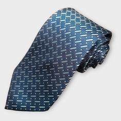 Treat yourself with a new pattern and splash of color to your look with this unique tie set. 100% Silk Handmade Package Includes: Tie, Pocket Square & Cufflinks. Length: 59" Width: 3.34" Warm iron if needed Modern Blue Ties For Business, Modern Blue Tie For Business, Modern Blue Ties For Formal Occasions, Modern Blue Suit And Tie Accessories For Formal, Modern Blue Suit And Tie Accessories For Formal Occasions, Adjustable Blue Ties For Formal Occasions, Father's Day Silver Suit And Tie Accessories, Silver Tie For Formal Occasions, Silver Tie For Father's Day Formal Wear