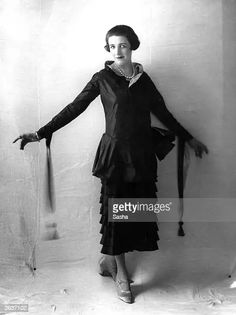 A model wears fashion by Poiret. News Photo - Getty Images Paul Poiret, Roaring Twenties, The Twenties, Getty Images, High Resolution, Resolution, How To Wear