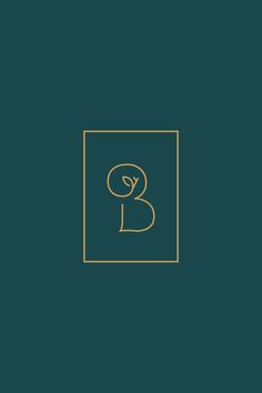 the letter b is inscribed in gold on a dark green background with a golden frame