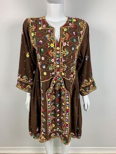 Afghan Vintage Balochi Embroidered Dress please contact for measurements. Traditional Brown Dresses With Resham Embroidery, Multicolor Embroidered Long Sleeve Embellished Dress, Embellished Long Sleeve Dress With Multicolor Embroidery, Traditional Brown Embroidered Dress, Brown Long Sleeve Traditional Dress, Multicolor Embroidered Dress For Fall, Embellished Tunic Dress For Festival, Long Sleeve Embellished Festival Dress, Balochi Dress