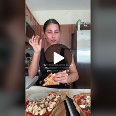 a woman standing in front of two pizzas