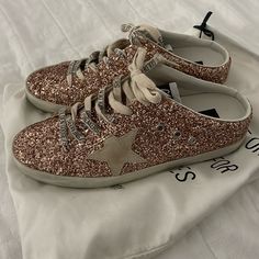 Never Worn. Excellent Condition. Size 39 Euro. I Wear A Size 8.5 Or 9 In Gg. Comes With Dust Bag And Original Box. No Lowball Offers Shoes Golden Goose, Goose Shoes, Glitter Sneakers, Golden Goose Shoes, Super Star, Golden Goose, Womens Shoes Sneakers, Original Box, Dust Bag