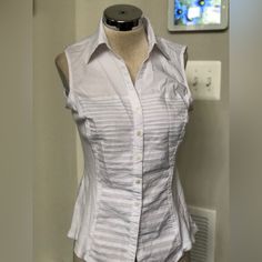 Nice Wardrobe Staple Casual Sleeveless Shirt For Work, Chic Sleeveless Cotton Shirt, White Sleeveless Shirt For Work, Elegant Cotton Sleeveless Blouse Vest, Classic Spring Vest, Elegant Sleeveless Shirt For Workwear, Fitted Sleeveless Cotton Vest, Classic Sleeveless Summer Shirt, Classic Sleeveless Blouse Tank Top For Spring