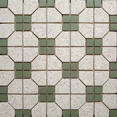 a white and green tiled floor with small square tiles on the top, bottom and bottom