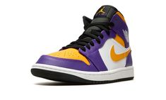 The Air Jordan 1 Mid “Lakers” is a colorway of the lifestyle shoe that features the team uniform colors of the Los Angeles Lakers on its design.  The Jordan 1 Mid is not officially affiliated with the Lakers in any way, although it does draw favorably from the basketball team’s uniform colors.  Yellow leather appears on the perforated toe and collar while contrasting purple leather is found on the overlays.  A yellow leather Swoosh appears on either side of the shoe and a white “Wings” logo can Throwback Jordan Shoes For Streetwear, Purple High-top Basketball Sneakers, Purple High-top Sneakers For Basketball, Casual Purple Sneakers For Basketball, Throwback Low-top Jordan Shoes For Basketball, Throwback Basketball Shoes With Gum Sole, Throwback Basketball Shoes With Boost Midsole, Throwback High-top Basketball Shoes For Sports, Purple Basketball Shoes For Streetwear