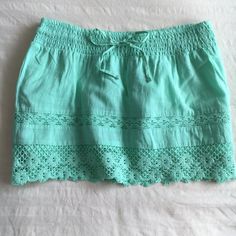 Mint / Teal Green Wmini Skirt Bought From Zumiez And Never Worn! Double Lined Size Xs With Drawstring Waist. Material Is Like A Cottony Linen With Crochet Lace Detail Along The Bottom! Bundle For A Discount Buy Skirts, Crochet Skirt, Teal Green, Crochet Lace, Lace Detail, Drawstring Waist, Blue Green, Womens Skirt, Mint