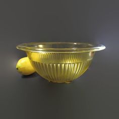 A beautiful 1970's reproduction glass serving bowl of Federal Glass Company's 1930's amber colored Depression glass that presents itself as new. Federal Glass Company referred to these reproductions as their "Recollections" line. It is 4 3/4" in height at the 10 3/4" diameter lip, tapers to rest on a 3" "square" raised foot, and comfortably holds 10 US fluid cups. Pattern Bowl, Glass Serving Bowls, Twin Falls, Glass Company, Amber Color, Glass Bowl, Mixing Bowl, Serving Bowls, Amber