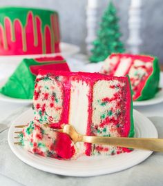 a slice of christmas cake on a plate with a fork