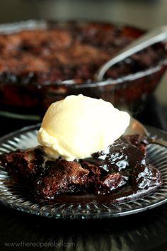 a piece of chocolate cake with ice cream on top