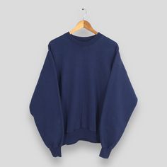 Vintage 90s Hanes Oversized Blue Sweatshirt XLarge Hanes Plain Sportswear Blue Jumper Hanes Activewear Crewneck Navy Blue Sweater Size XL Size On Tag : Size XL Manual Measurement :- WIDTH (armpit to armpit) :- 25.5" inches LENGTH (shoulder to end of garment) :- 27" inches WEIGH :- 0.45 kg Condition :- Good Condition. No holes and no stains. - Colors Might Be Different Due To Lighting. - All items are VINTAGE which show some signs of wear and tear. FEDEX EXPRESS = 3-6 business day arrived Please provide your PHONE/CONTACT NUMBER for SHIPPING/DELIVERY purpose.  VERY IMPORTANT ‼ for safer and easier delivery processes. REF - Z-28012024-3706 Affordable Oversized Blue Top, Cheap Navy Hoodie Sweatshirt, Cheap Blue Vintage Sweater, Cheap Vintage Blue Sweater, Navy Blue Sweat Shirts, Navy Blue Vintage Nike Sweatshirt, Vintage Nike Sweatshirt Navy, Cheap Vintage Blue Sweatshirt, Dark Blue Sweatshirt