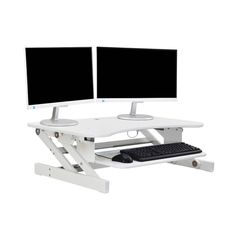 two computer monitors sitting on top of a white desk next to a keyboard and mouse