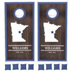 two cornhole game boards with the state of indiana on them and blue trims