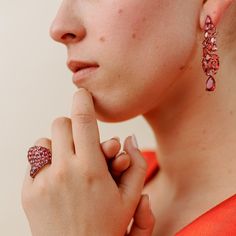 Long earrings can add a touch of elegance and glamour to any outfit, especially when dressing up for a night out. These beautiful fuchsia earrings are a perfect example of how accessories can enhance your overall look. The bold color of these earrings will make them stand out and draw attention to your face, while the length will add a sense of drama and sophistication. When wearing long earrings, it's important to keep the rest of your jewelry minimal so that the earrings can be the star of the Luxury Ruby Earrings For Evening, Pink Fine Jewelry Earrings For Party, Elegant Red Earrings For Party, Luxury Red Earrings For Party, Fine Jewelry Sparkling Stones Earrings For Evening, Fine Jewelry Earrings With Sparkling Stones For Evening, Luxury Red Party Earrings, Ruby Fine Jewelry Earrings For Party, Fine Ruby Earrings For Parties