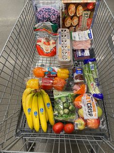 a shopping cart filled with lots of food