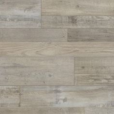 an image of wood flooring that looks like it has been painted in grey tones