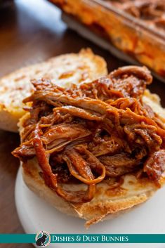 pulled pork sandwich on toasted bread with barbecue sauce