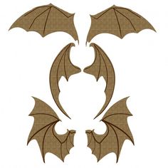 an image of two bats with wings cut out from the paper and placed on top of each other