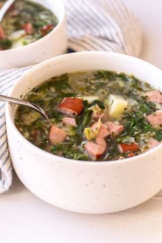 two bowls filled with soup on top of a table