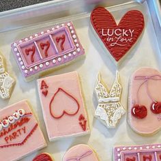 decorated cookies in the shape of hearts and other items