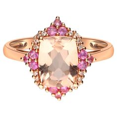 This lovely ring from Gin & Grace offers a large emerald-cut Genuine morganite center stone surrounded by round-cut Genuine pink sapphires and Natural white diamonds. The 14-karat rose gold construction of this jewelry is finished with an attractive high polish. Gemstone colors: Pink Gemstone shapes: One prong-set Cushion-cut Genuine morganite measures 7 mm wide x 9 mm long Gemstone weight: 2 carats 12 prong-set round cut natural pink sapphires each measure 1.5 mm Gemstone weight: 0.22 carat Tot Pink Sapphire Band, Sapphire Side Stones, Ring Rosegold, Morganite Diamond, Sapphire Band, Rose Gold Bridal, Pink Sapphire Ring, Rose Gold Diamond Ring, 14k Rose Gold Ring