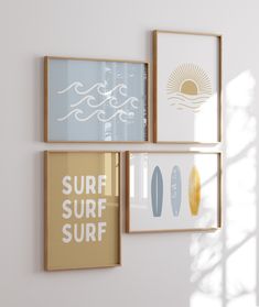 three framed pictures hang on the wall next to each other with surfboards in them