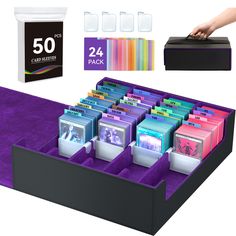 an assortment of different colored file folders in a display case with the lid open