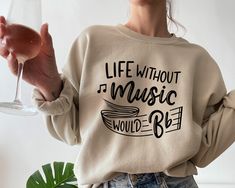 Life Without Music Would Be Flat Sweatshirt This crewneck sweatshirt is pure comfort. Made from a soft cotton/poly blend with no itchy side seams, this is sure to become a staple. SIZE AND FIT: Your sweatshirt design will be printed on a high-quality, soft and comfortable unisex sweatshirt. Sizes run true to size, which takes the guesswork out of ordering; if you like your sweatshirts loose or oversized, you might want to order a size up and if you'd like a more fitted women's style then order a Music Teacher Gift, Music Teacher Gifts, Lover Sweatshirt, Musical Notes, Music Gifts, Music Teacher, Music Lover, Funny Shirt, Sweatshirt Designs