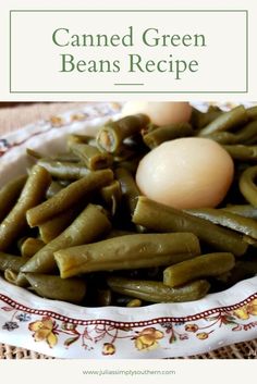 green beans in a bowl with an egg on top and the words canned green beans recipe