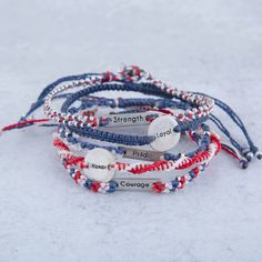 What Makes A Hero Wakami Bracelets - Set Of 5 Adjustable Patriotic Friendship Bracelets, Adjustable Patriotic Friendship Bracelets For 4th Of July, Patriotic Adjustable Friendship Bracelets, Adjustable Friendship Bracelets For 4th Of July, Adjustable Patriotic Friendship Bracelets As Gifts, Patriotic Multicolor Friendship Jewelry, What Makes A Hero, Patriotic Words, Paw Print Jewelry