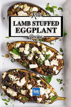 two stuffed eggplant on a white plate with feta cheese and parsley