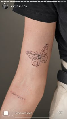 a small butterfly tattoo on the left arm and right arm with an inkyfrank logo