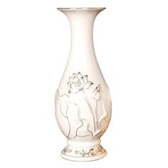 a white vase with an elephant and flower design on the bottom, sitting in front of a white background