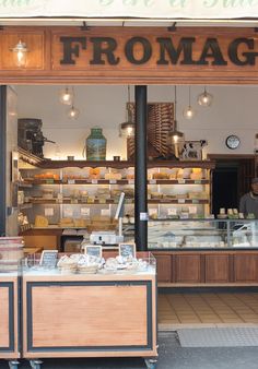 Paris Cheese Shop - Every Day Paris Cheese Shop Design, Parisian Breakfast, Purple Cafe, Store Facade, Paris Packing, Cheese Store, Deli Shop, Paris Kitchen, Green Cafe