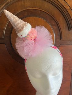 We all scream for ice cream  Pink bubble gum  ice cream cone with sprinkles upside down in pink sparkly tulle, attached to white satin headband striped with two shades of pink ribbon  Different color ribbon is available upon request Headband measures 1 inch wide Lightweight and comfortable One size fits most Playful Summer Party Supplies, Fun Pink Summer Party Supplies, Summer Fun Pink Party Supplies, Fun Carnival Party Supplies, Whimsical Party Supplies For Birthday And Carnival, Cute Summer Birthday Party Supplies, Cute Birthday Party Supplies For Summer, Adjustable Pink Party Supplies For Summer, Fun Pink Party Supplies