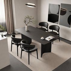 a dining table with four chairs around it