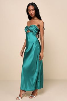 You'll be looking especially extraordinary in the Lulus So Rare Emerald Green Satin Strapless Twist-Front Midi Dress! Glossy woven satin shapes this head-turning dress that falls from a strapless, sweetheart neckline (with hidden no-slip strips) into a pleated, twist-front bodice that creates a flirty cutout. The high, fitted waist sits atop a figure-skimming slip skirt that finishes at a chic midi hem. Turn around to reveal two elasticized straps that lay across the otherwise open-back design. Pre-draped Satin Strapless Dress For Gala, Strapless Pre-draped Satin Maxi Dress, Pre-draped Satin Strapless Party Dress, Formal Pre-draped Strapless Satin Dress, Satin Strapless Dress With Ruched Bodice For Evening, Green Draped Satin Evening Dress, Glamorous Satin Strapless Evening Dress, Strapless Satin Maxi Evening Dress, Draped Satin Strapless Dress For Gala