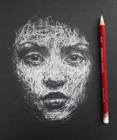 a pencil drawing of a woman's face on a black paper with white thread