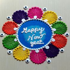 a happy new year card with colorful flowers